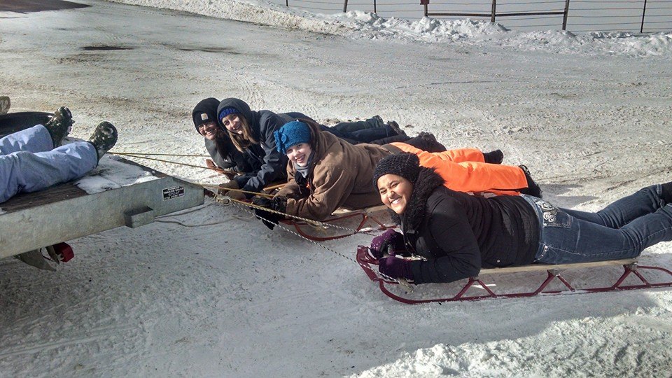 4H Kids having a fun time sledding